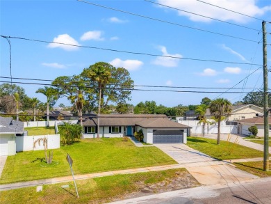 Freshly renovated and ready for a new chapter, 6070 Denver St NE on Mangrove Bay Golf Course in Florida - for sale on GolfHomes.com, golf home, golf lot