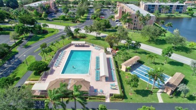 REMODELED GORGEOUS DOUBLE LAKE VIEW FROM 2ND FLOOR. NEW KITCHEN on Marina Lakes Golf Course in Florida - for sale on GolfHomes.com, golf home, golf lot