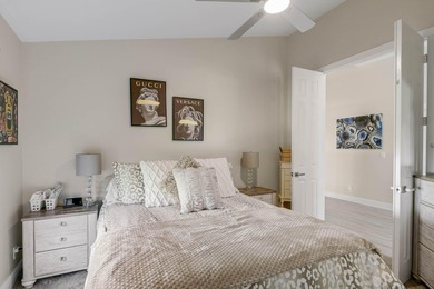 Nestled within a gated community, this spacious split-plan home on Fountains Golf and Country Club in Florida - for sale on GolfHomes.com, golf home, golf lot