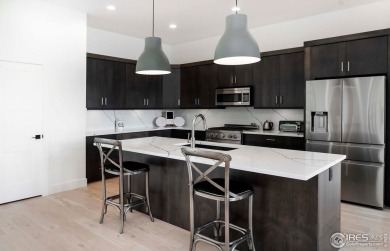 Open House Sat 6/7 & Sun 6/8 12-3pm. Lakefront Luxury Living - on Pelican Lakes Golf and Country Club in Colorado - for sale on GolfHomes.com, golf home, golf lot