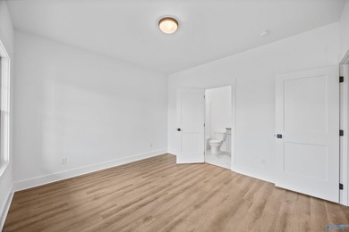 This beautifully crafted residence features an open floor plan on Canebrake Golf Club in AL - for sale on GolfHomes.com, golf home, golf lot