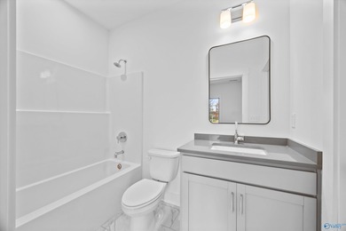 This beautifully crafted residence features an open floor plan on Canebrake Golf Club in AL - for sale on GolfHomes.com, golf home, golf lot