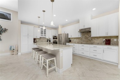 This exceptional custom-built D.M. Dean residence sits on a rare on Rotonda Golf and Country Club - Long Marsh  in Florida - for sale on GolfHomes.com, golf home, golf lot