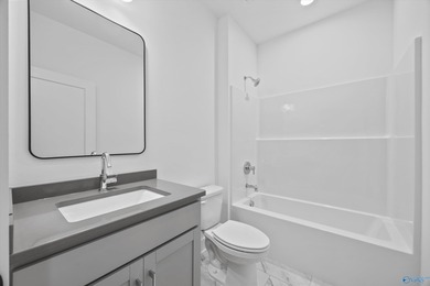 This beautifully crafted residence features an open floor plan on Canebrake Golf Club in AL - for sale on GolfHomes.com, golf home, golf lot