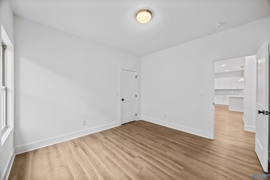 This beautifully crafted residence features an open floor plan on Canebrake Golf Club in AL - for sale on GolfHomes.com, golf home, golf lot