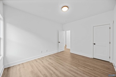 This beautifully crafted residence features an open floor plan on Canebrake Golf Club in AL - for sale on GolfHomes.com, golf home, golf lot