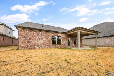 This beautifully crafted residence features an open floor plan on Canebrake Golf Club in AL - for sale on GolfHomes.com, golf home, golf lot