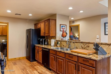 Luxury living meets low-maintenance ease in this free-standing on Pinetop Lakes Golf and Country Club in Arizona - for sale on GolfHomes.com, golf home, golf lot