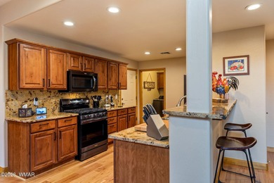 Luxury living meets low-maintenance ease in this free-standing on Pinetop Lakes Golf and Country Club in Arizona - for sale on GolfHomes.com, golf home, golf lot