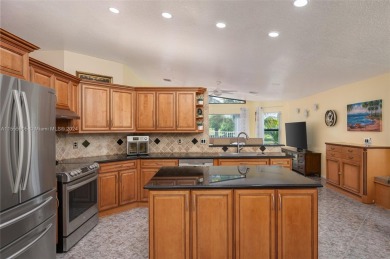 A special home waiting for you. Move-in ready 3BR with 2.5 baths on Woodmont Country Club in Florida - for sale on GolfHomes.com, golf home, golf lot