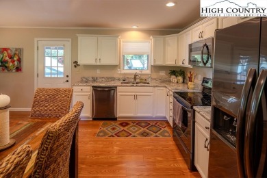 Golf Course Home with Garage and Golf Cart Storage.  This on Land Harbor Golf Course in North Carolina - for sale on GolfHomes.com, golf home, golf lot