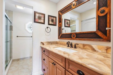 Step inside and be greeted by an inviting spacious layout. Make on Quail Ridge Golf Course and Country Club in Florida - for sale on GolfHomes.com, golf home, golf lot