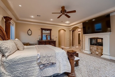 Experience the pinnacle of luxury living in this 8,447 SF on Red Rock Country Club in Nevada - for sale on GolfHomes.com, golf home, golf lot