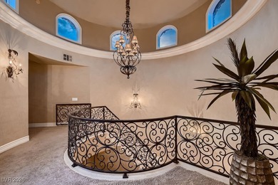 Experience the pinnacle of luxury living in this 8,447 SF on Red Rock Country Club in Nevada - for sale on GolfHomes.com, golf home, golf lot