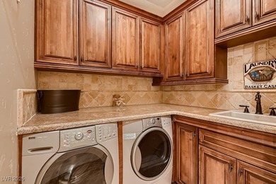 Experience the pinnacle of luxury living in this 8,447 SF on Red Rock Country Club in Nevada - for sale on GolfHomes.com, golf home, golf lot