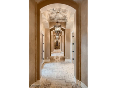 Experience the pinnacle of luxury living in this 8,447 SF on Red Rock Country Club in Nevada - for sale on GolfHomes.com, golf home, golf lot