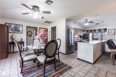 Wake up to sweeping golf course views in this distinctive on Palmetto-Pine Country Club in Florida - for sale on GolfHomes.com, golf home, golf lot