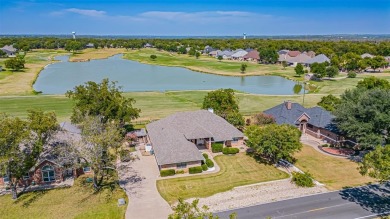 Experience refined living in this stunning golf course residence on Pecan Plantation Country Club in Texas - for sale on GolfHomes.com, golf home, golf lot