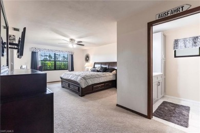 Wake up to sweeping golf course views in this distinctive on Palmetto-Pine Country Club in Florida - for sale on GolfHomes.com, golf home, golf lot