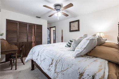 Wake up to sweeping golf course views in this distinctive on Palmetto-Pine Country Club in Florida - for sale on GolfHomes.com, golf home, golf lot
