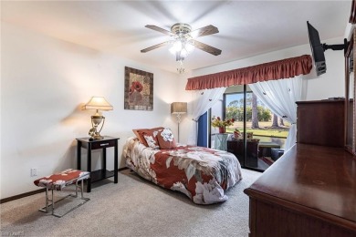 Wake up to sweeping golf course views in this distinctive on Palmetto-Pine Country Club in Florida - for sale on GolfHomes.com, golf home, golf lot