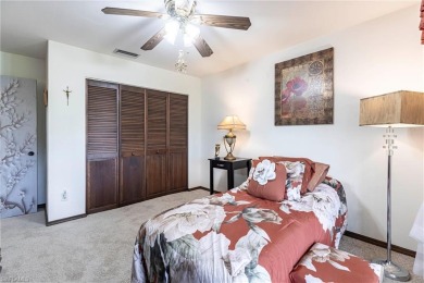 Wake up to sweeping golf course views in this distinctive on Palmetto-Pine Country Club in Florida - for sale on GolfHomes.com, golf home, golf lot