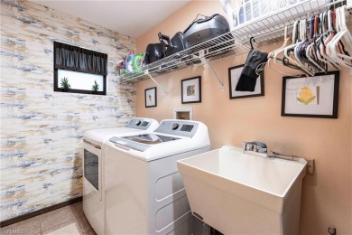 Wake up to sweeping golf course views in this distinctive on Palmetto-Pine Country Club in Florida - for sale on GolfHomes.com, golf home, golf lot