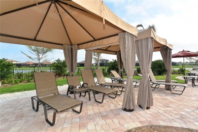 Enjoy spectacular water and golf views from this TURNKEY on River Strand Golf and Country Club At Heritage Harbour  in Florida - for sale on GolfHomes.com, golf home, golf lot