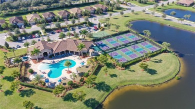 Enjoy spectacular water and golf views from this TURNKEY on River Strand Golf and Country Club At Heritage Harbour  in Florida - for sale on GolfHomes.com, golf home, golf lot