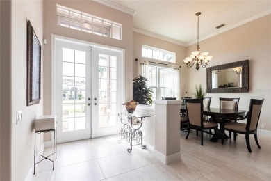 Experience the ultimate Florida lifestyle in the exclusive award on Pelican Pointe Golf and Country Club in Florida - for sale on GolfHomes.com, golf home, golf lot