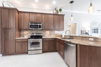 Experience the ultimate Florida lifestyle in the exclusive award on Pelican Pointe Golf and Country Club in Florida - for sale on GolfHomes.com, golf home, golf lot