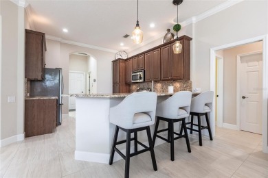 Experience the ultimate Florida lifestyle in the exclusive award on Pelican Pointe Golf and Country Club in Florida - for sale on GolfHomes.com, golf home, golf lot