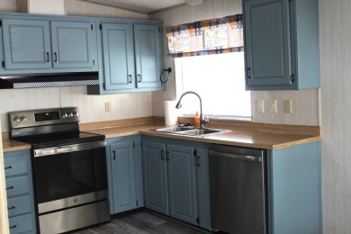 Welcome to this beautifully updated 2-bedroom home that offers on Schalamar Creek Golf and Country Club in Florida - for sale on GolfHomes.com, golf home, golf lot