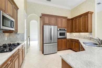 Welcome to refined elegance in the prestigious, gated community on Tuscany Reserve in Florida - for sale on GolfHomes.com, golf home, golf lot