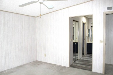Welcome to this beautifully updated 2-bedroom home that offers on Schalamar Creek Golf and Country Club in Florida - for sale on GolfHomes.com, golf home, golf lot