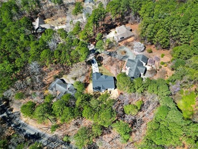 Stunning new construction located in the sought-after, guarded on Carolina Trace Country Club in North Carolina - for sale on GolfHomes.com, golf home, golf lot