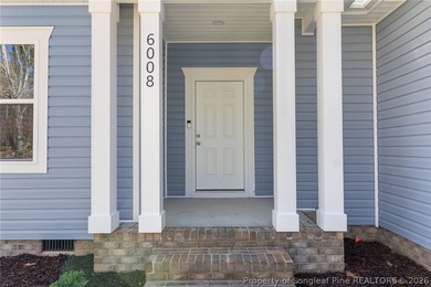 Stunning new construction located in the sought-after, guarded on Carolina Trace Country Club in North Carolina - for sale on GolfHomes.com, golf home, golf lot