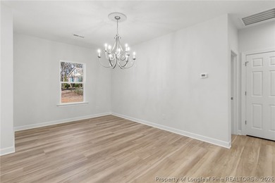 Stunning new construction located in the sought-after, guarded on Carolina Trace Country Club in North Carolina - for sale on GolfHomes.com, golf home, golf lot