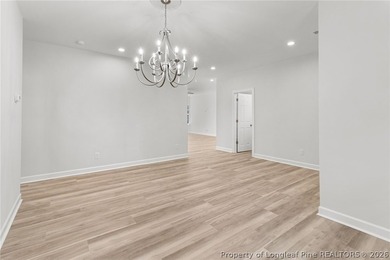 Stunning new construction located in the sought-after, guarded on Carolina Trace Country Club in North Carolina - for sale on GolfHomes.com, golf home, golf lot