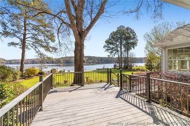 Stunning lakefront living awaits at 253 Lakeview Dr in the on Carolina Trace Country Club in North Carolina - for sale on GolfHomes.com, golf home, golf lot
