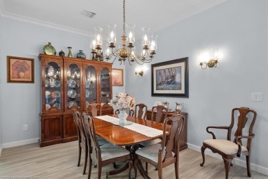 This *LARGER THAN IT LOOKS* 3 bedroom, 2.5 bath, oversized 2-car on  in Florida - for sale on GolfHomes.com, golf home, golf lot