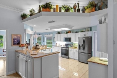This *LARGER THAN IT LOOKS* 3 bedroom, 2.5 bath, oversized 2-car on  in Florida - for sale on GolfHomes.com, golf home, golf lot