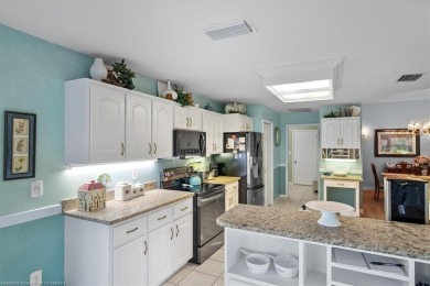 This *LARGER THAN IT LOOKS* 3 bedroom, 2.5 bath, oversized 2-car on  in Florida - for sale on GolfHomes.com, golf home, golf lot