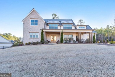 Welcome to this stunning 5 bedroom, 3.5 bathroom home in the on The Governors Towne Club in Georgia - for sale on GolfHomes.com, golf home, golf lot
