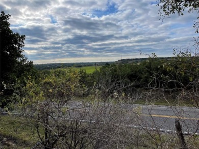 Seller financing with low interest rate for this .35 acre lot on Hideout Golf Club and Resort  in Texas - for sale on GolfHomes.com, golf home, golf lot