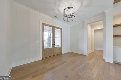 Welcome to this stunning 5 bedroom, 3.5 bathroom home in the on The Governors Towne Club in Georgia - for sale on GolfHomes.com, golf home, golf lot