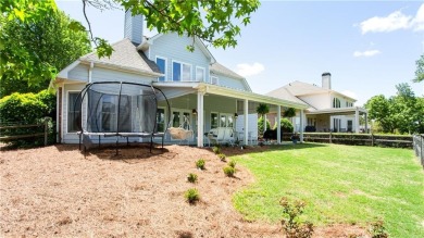 Hampton Golf Village! Stunning 3 sided brick home features the on Hampton Golf Village in Georgia - for sale on GolfHomes.com, golf home, golf lot