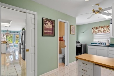 This *LARGER THAN IT LOOKS* 3 bedroom, 2.5 bath, oversized 2-car on  in Florida - for sale on GolfHomes.com, golf home, golf lot