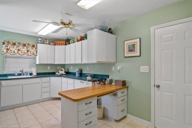 This *LARGER THAN IT LOOKS* 3 bedroom, 2.5 bath, oversized 2-car on  in Florida - for sale on GolfHomes.com, golf home, golf lot