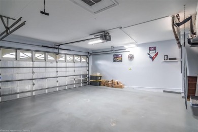 This *LARGER THAN IT LOOKS* 3 bedroom, 2.5 bath, oversized 2-car on  in Florida - for sale on GolfHomes.com, golf home, golf lot
